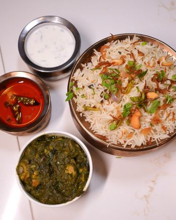 Bicyclist looking out over hill at ocean